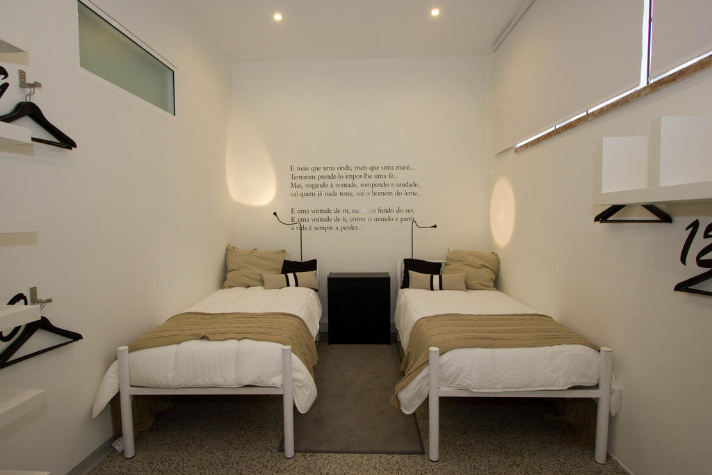 Turismo Do Seculo Ξενοδοχείο Εστορίλ Δωμάτιο φωτογραφία A bedroom in the hotel